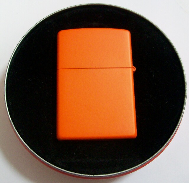 画像: ★２０００年 ミレニアム記念　GET　OVER　IT！クリック缶　全面オレンジ　ZIPPO！新品